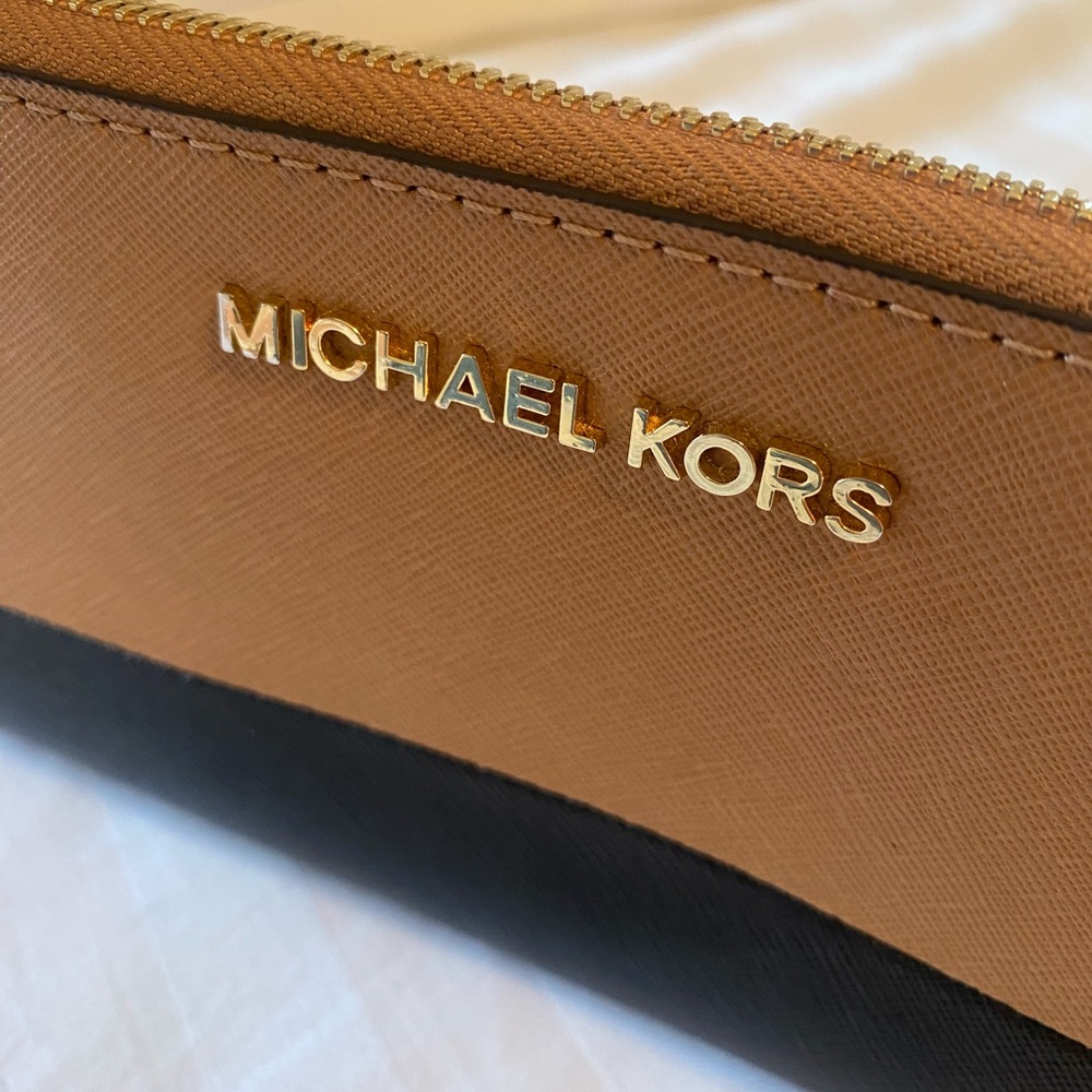 Michael Kors large two-toned pebbled-leather wallet, like new.